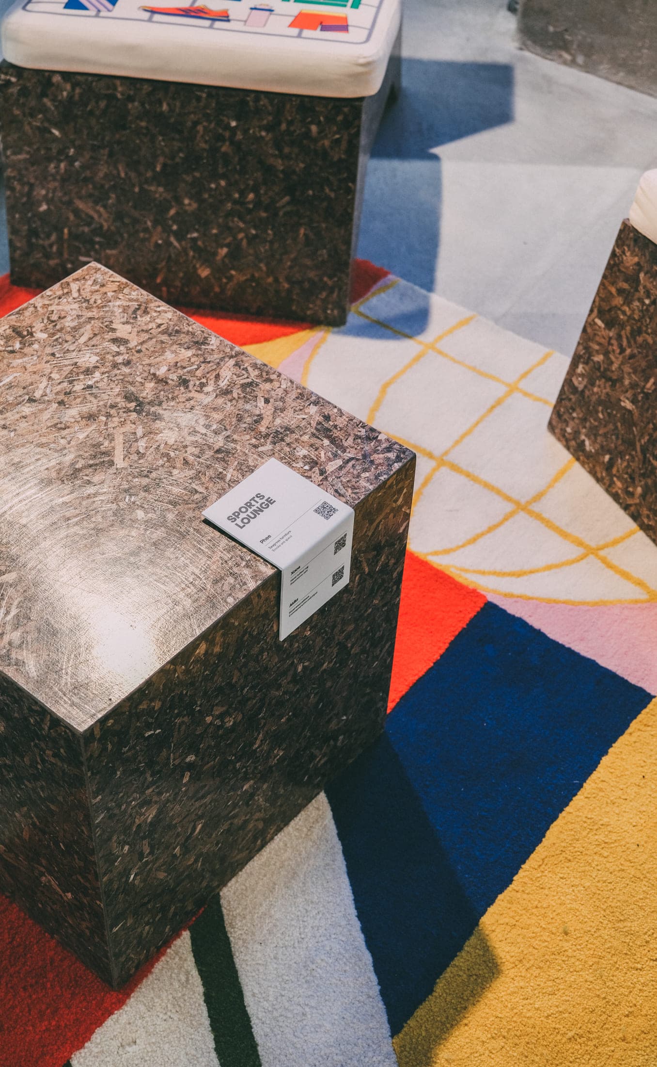 Adidas Athens — PHEE Board cube detail on the colourful court rug