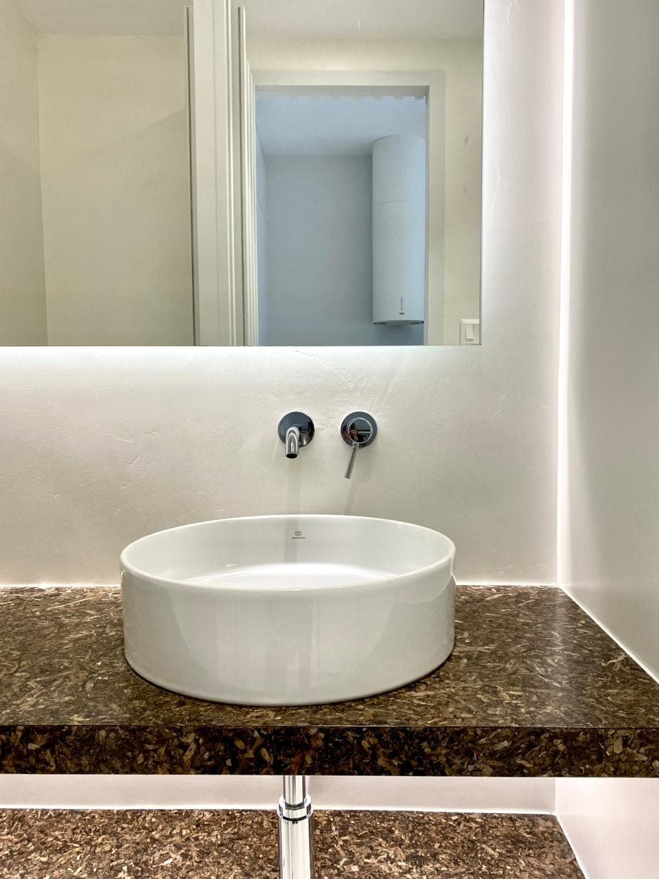 Detail — PHEE vanity top and wall-mounted taps