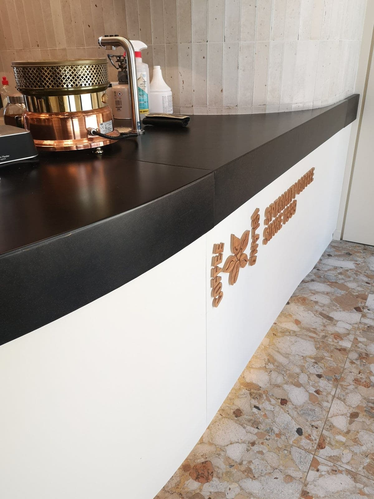Coffee Island wordmark on CoPHEE Board bar front