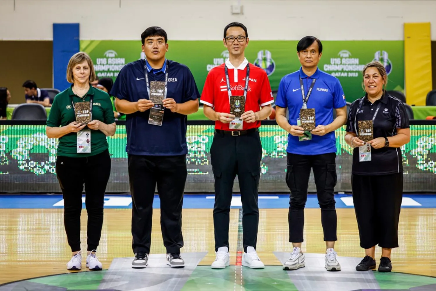 Coaches holding PHEE Board Top Performer awards at the FIBA U16 Asian Championship, Qatar 2023