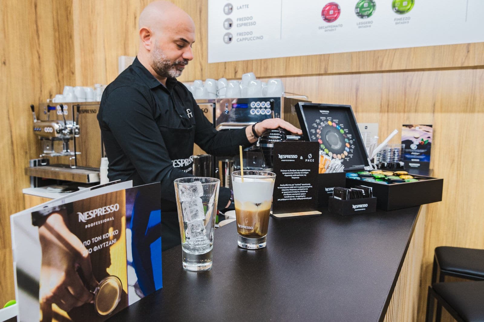 Barista serving from CoPHEE Board counter