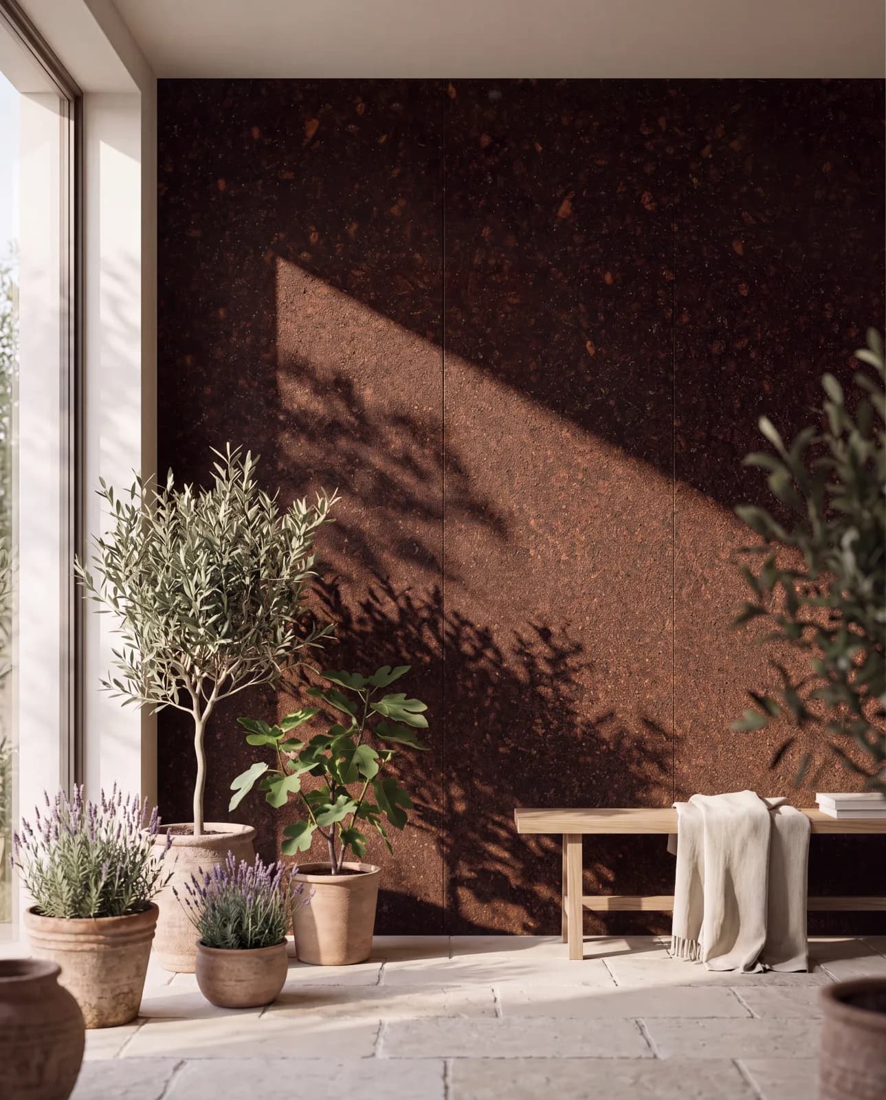 Sunlit interior with a textured PHEE bio-composite wall panel and Mediterranean plants